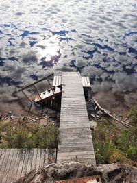 High angle view of building by sea against sky