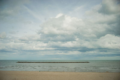 Scenic view of beach against sky