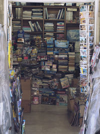 Stack of books in shelf at store