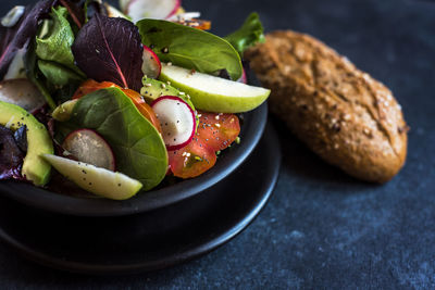 Close-up of fruits in plate on table