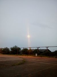 Scenic view of field against clear sky