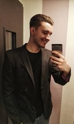 Young man using mobile phone