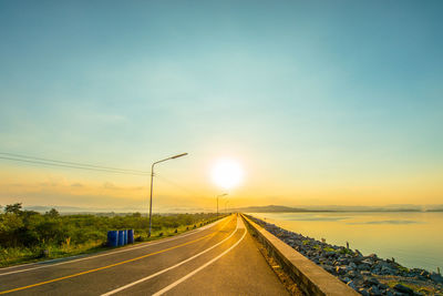 Road against sky during sunset