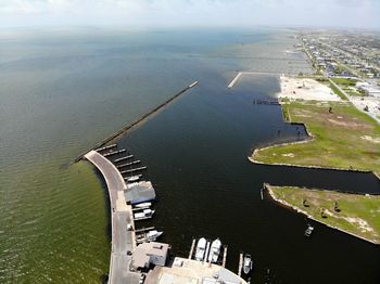 High angle view of city by sea