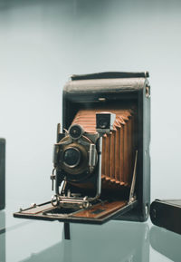 Close-up of camera on table