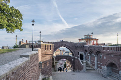 Bridge over river against sky