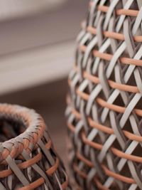 Close-up of wicker basket on wood