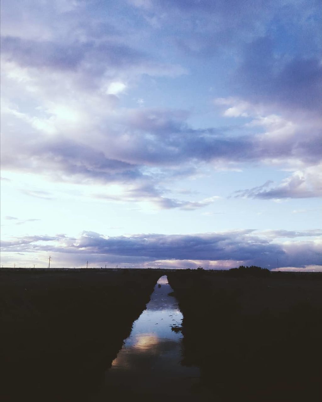 cloud - sky, sky, scenics - nature, nature, no people, beauty in nature, tranquil scene, tranquility, architecture, day, built structure, outdoors, water, landscape, environment, building exterior, silhouette, idyllic