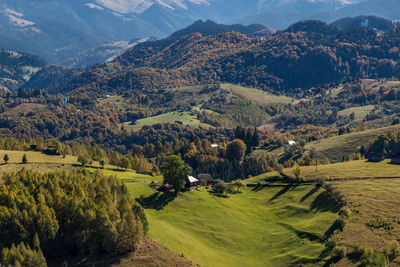 Scenic view of agricultural field against mountains