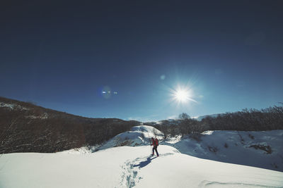 Scenic view of snowcapped mountain against sky