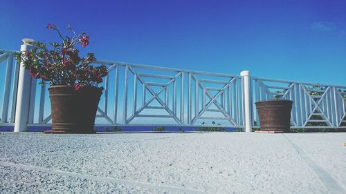 Metallic structure against blue sky