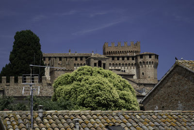 Buildings against blue sky