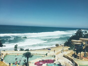 High angle view of beach against clear blue sky