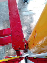 High angle view of multi colored metal in container