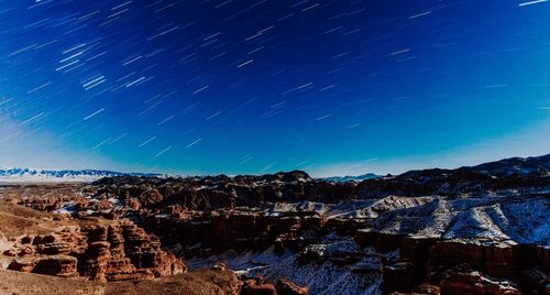 Scenic view of star field against sky at night