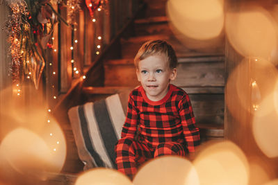 Portrait of cute girl playing with balloons