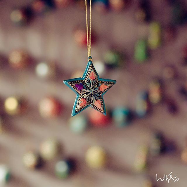 star shape, christmas, decoration, celebration, focus on foreground, hanging, tradition, illuminated, close-up, christmas decoration, christmas tree, multi colored, low angle view, selective focus, no people, outdoors, night, cultures, christmas lights