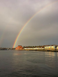 Rainbow over city