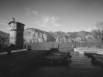 Boats moored at harbor