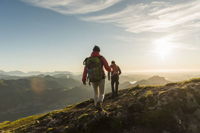 Austria, salzkammergut, couple hiking in the mountains