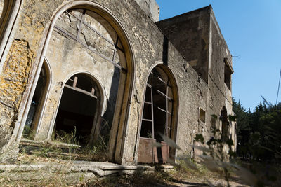 Low angle view of abandoned building