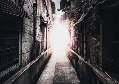 Narrow alley amidst buildings