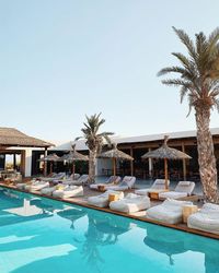 View of swimming pool against clear blue sky