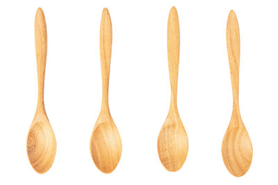 Close-up of umbrellas against white background