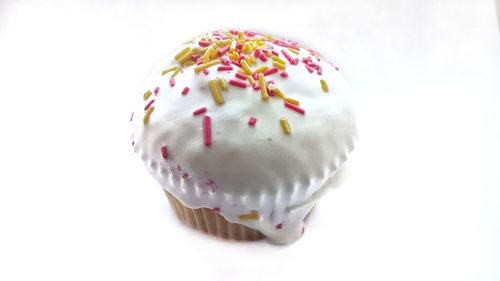 Close-up of cupcakes against white background