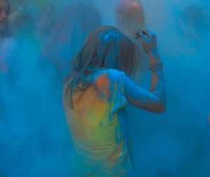 Smudged girl during festival celebration