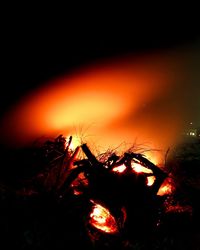 Low angle view of bonfire against sky at night