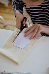 High angle view of woman working on table