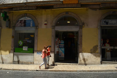 Man standing in front of building