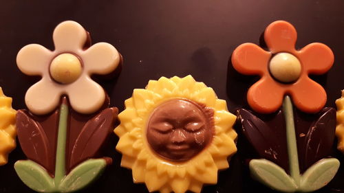 Close-up of cupcakes against black background