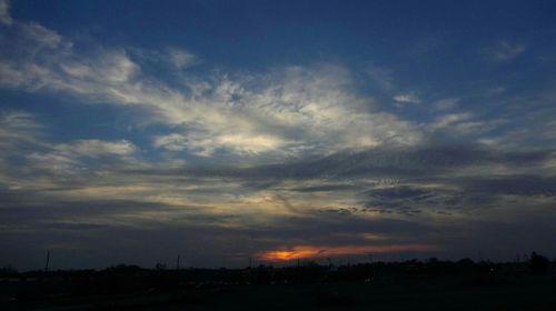 Scenic view of dramatic sky during sunset