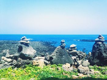 Scenic view of sea against clear sky