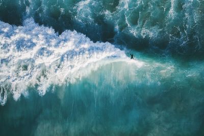 High angle view of man surfing in sea