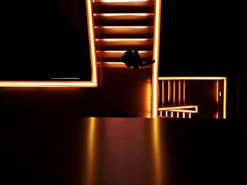 View of woman in the dark