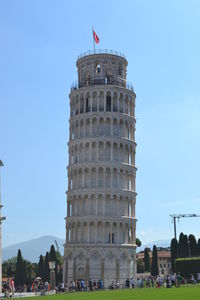 Low angle view of historical building against blue sky