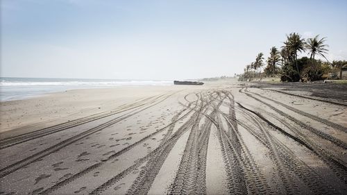 Scenic view of beach against sky