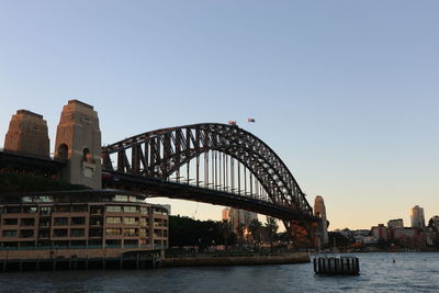 View of bridge over river in city