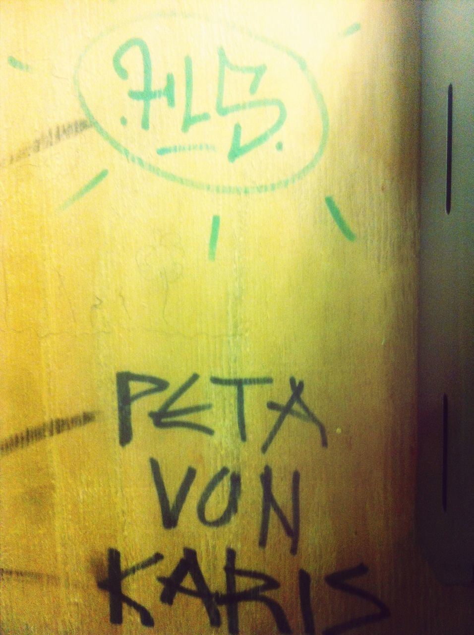 text, communication, western script, capital letter, sign, indoors, information sign, wall - building feature, guidance, information, non-western script, close-up, number, yellow, message, arrow symbol, wall, symbol, no people, human representation