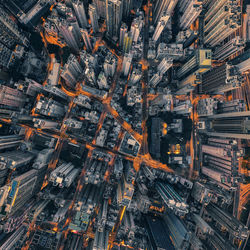 High angle view of illuminated modern buildings in city