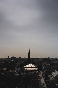 Buildings in city against sky