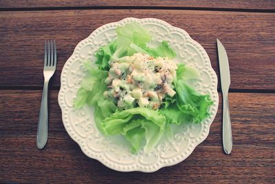 Directly above shot of salad in plate on table