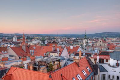 High angle view of townscape against sky at sunset