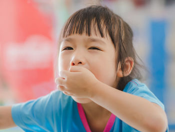 Close-up portrait of cute girl