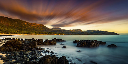 Scenic view of sea against sky at sunset