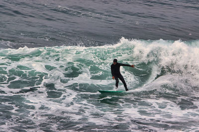 Man surfing in sea