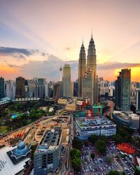Aerial view of petronas towers at sunset